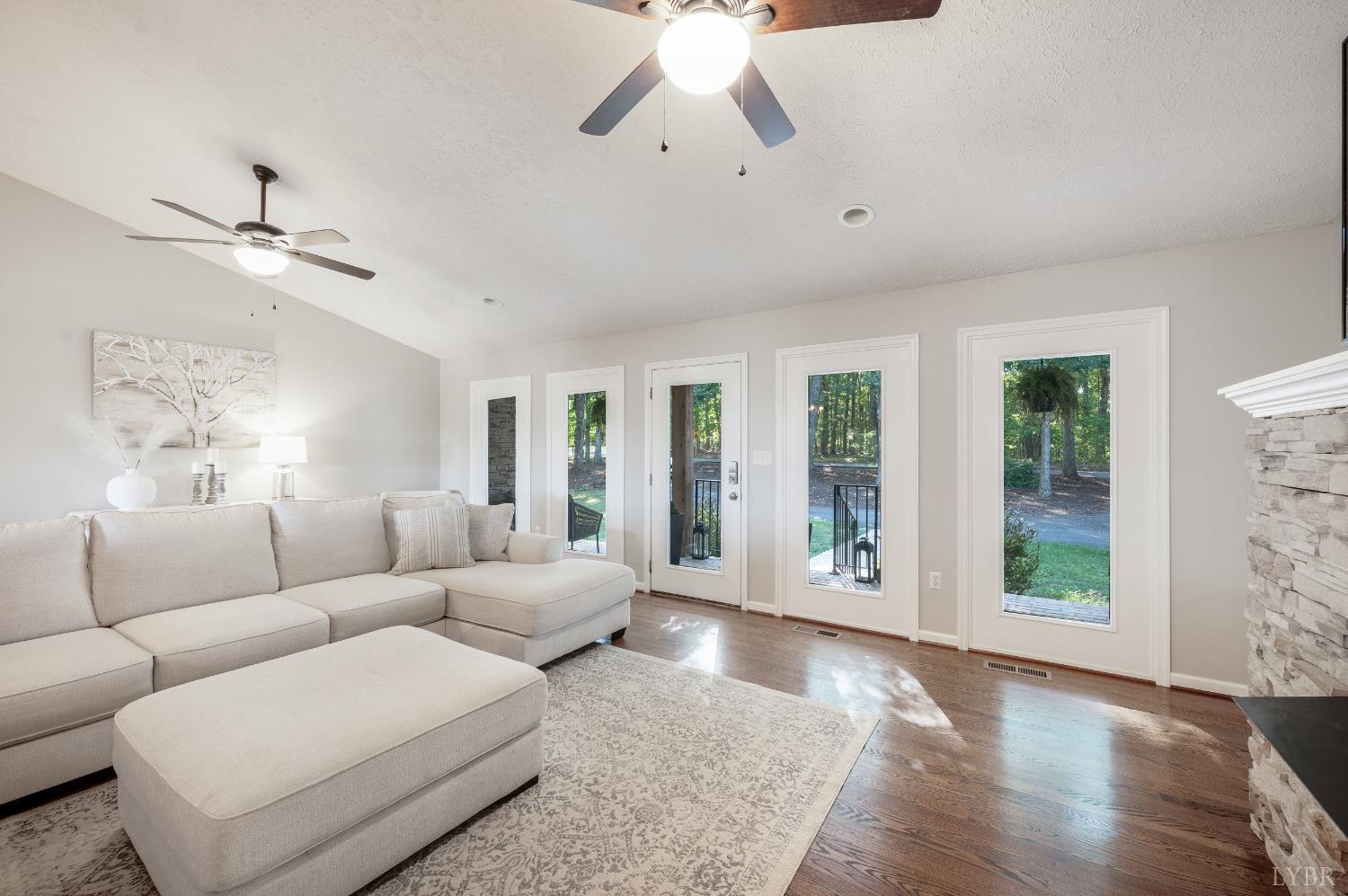 1203 Everett Road Forest, VA 24551 - Photo 11 of 68 a living room with furniture ceiling fan and a window