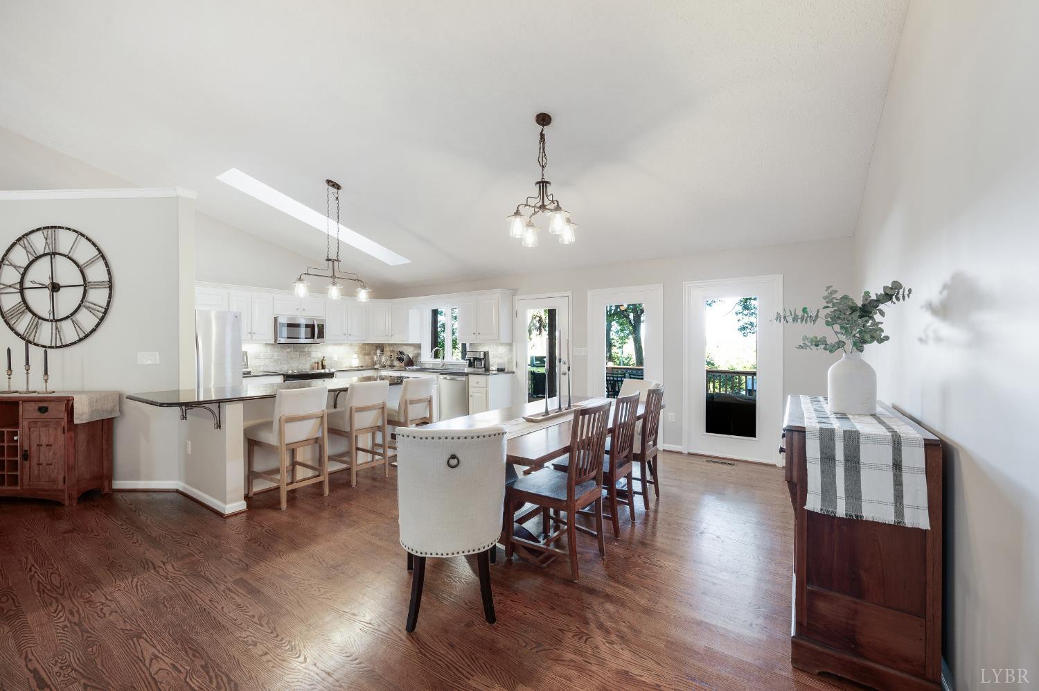 1203 Everett Road Forest, VA 24551 - Photo 13 of 68 a view of a dining room with furniture window and wooden floor