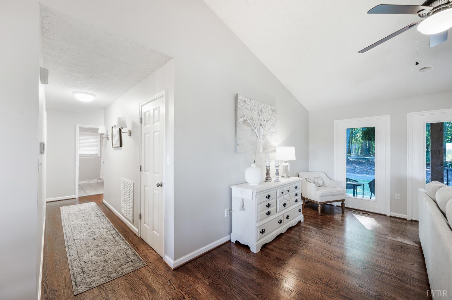 1203 Everett Road Forest, VA 24551 - Photo 20 of 68 a view of a bedroom with wooden floor and window