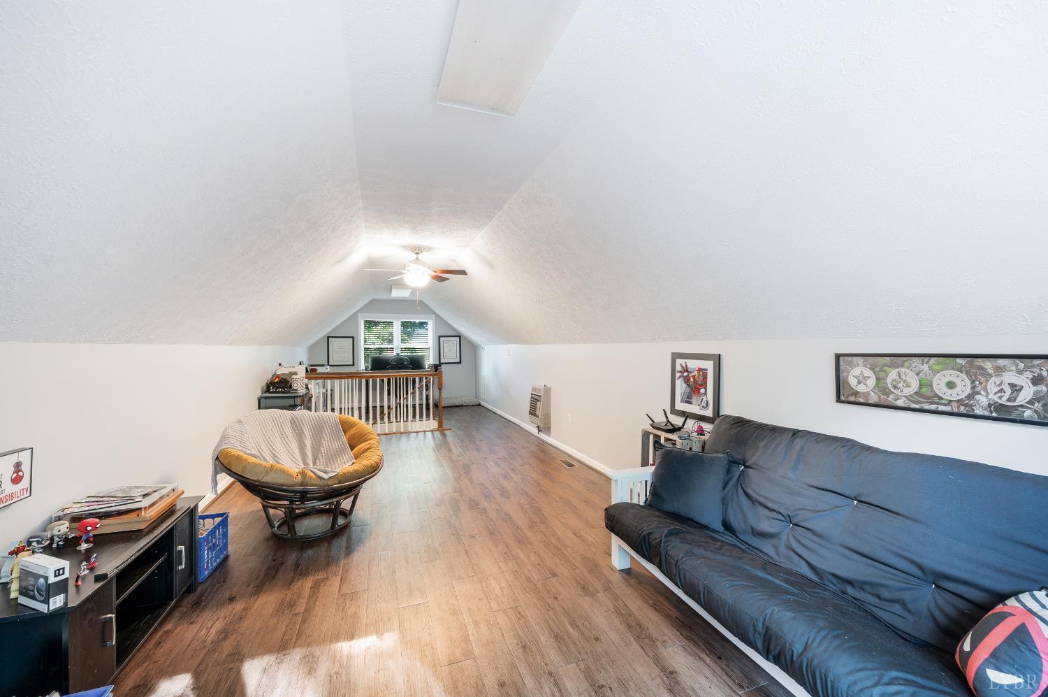 1203 Everett Road Forest, VA 24551 - Photo 44 of 68 a living room with furniture and a breakfast area