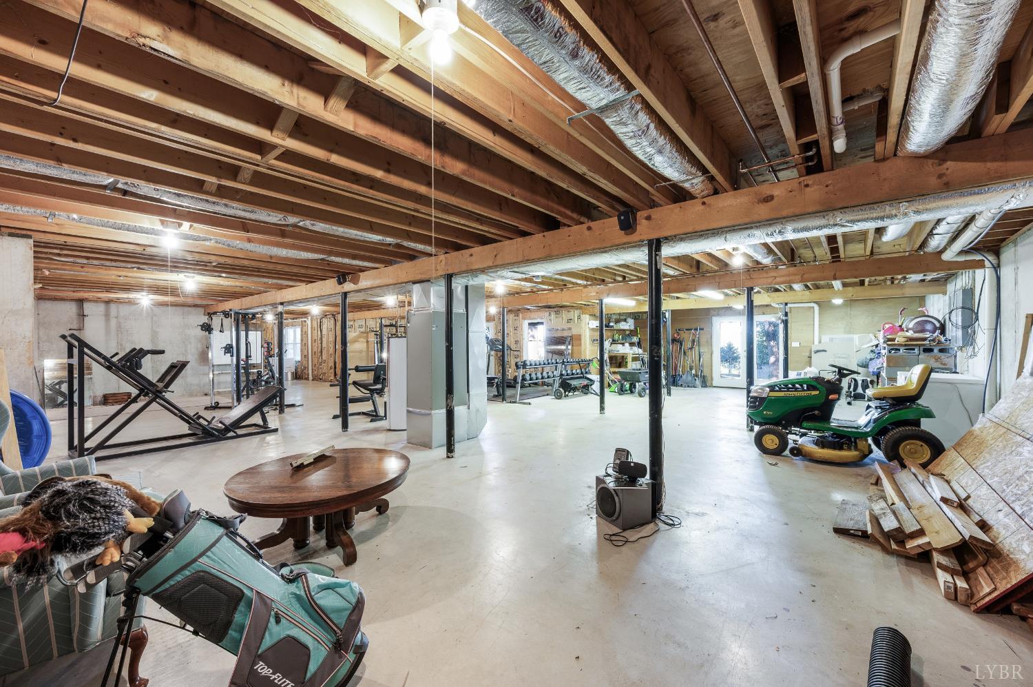 1203 Everett Road Forest, VA 24551 - Photo 48 of 68 a view of a swimming pool with outdoor seating