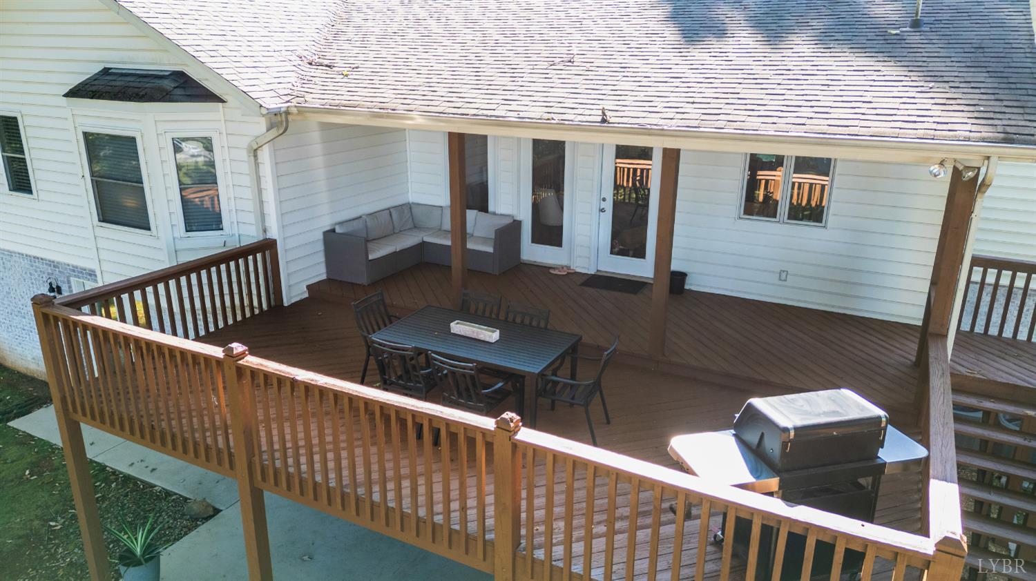1203 Everett Road Forest, VA 24551 - Photo 55 of 68 a view of backyard with deck and wooden floor