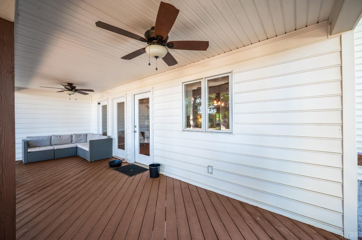 1203 Everett Road Forest, VA 24551 - Photo 58 of 68 a view of a livingroom with a hardwood floor and a ceiling fan