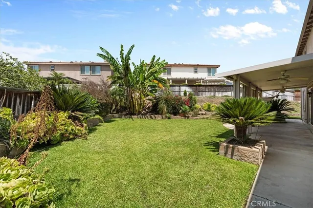a view of a yard with a fountain