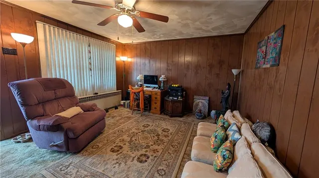 a bed room with furniture and a window