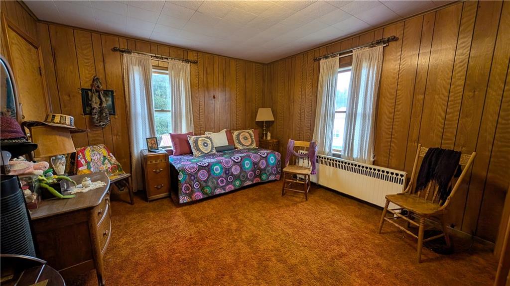 180 Liberty Street Perryopolis, PA 15473 - Photo 13 of 21 a bedroom with furniture and a window