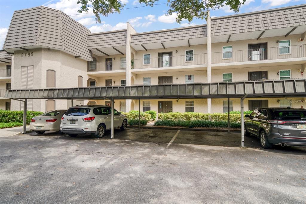 8799 Bardmoor Boulevard, Unit 105 Seminole, FL 33777 - Photo 1 of 33 a view of multiple house