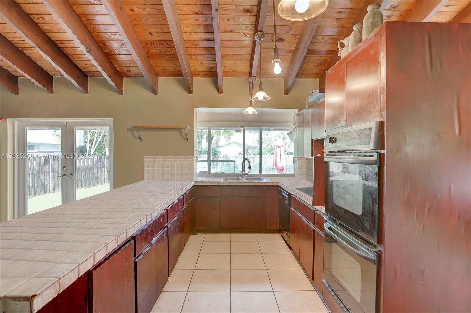 3501 North Park Road Hollywood, FL 33021 - Photo 18 of 30 a bathroom with a granite countertop tub and a shower