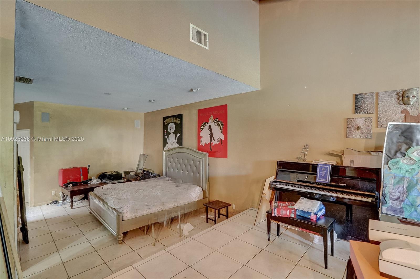 3501 North Park Road Hollywood, FL 33021 - Photo 23 of 30 a living room with furniture a piano and a rug