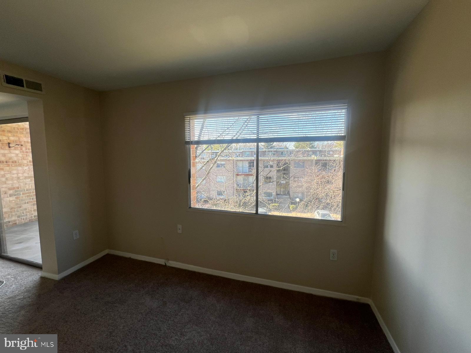 3732 Bel Pre Road, Unit 9 Silver Spring, MD 20906 - Photo 13 of 21 an empty room with a window