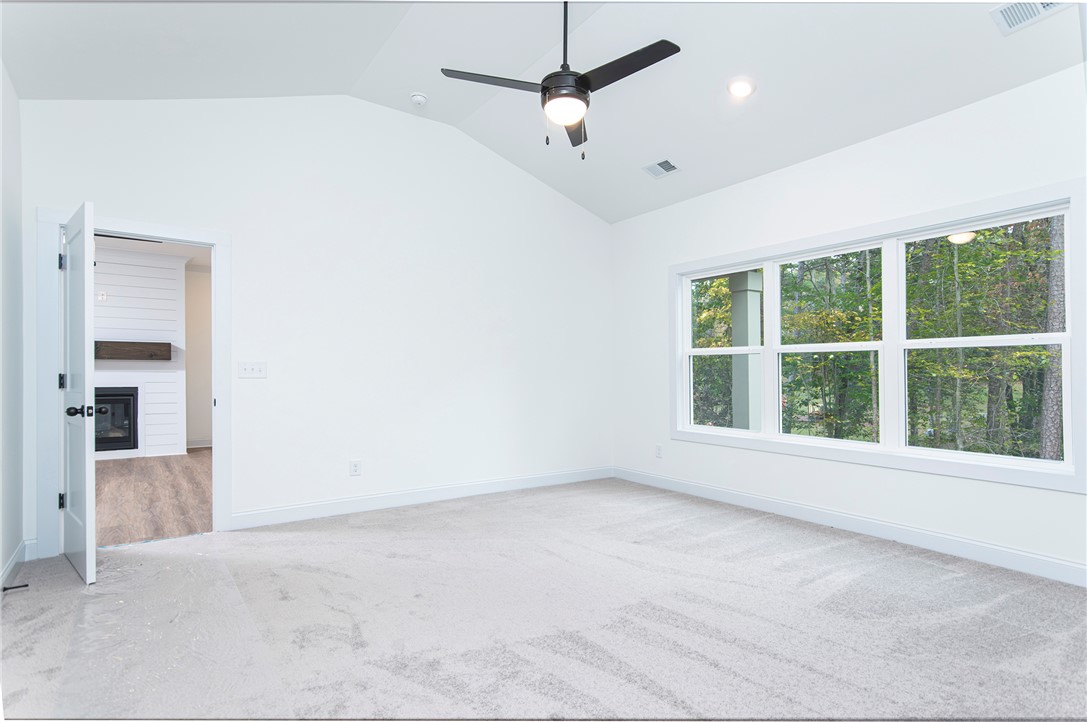 328 Point Road Westminster, SC 29693 - Photo 15 of 37 Bright and airy room with serene views of surrounding nature.
