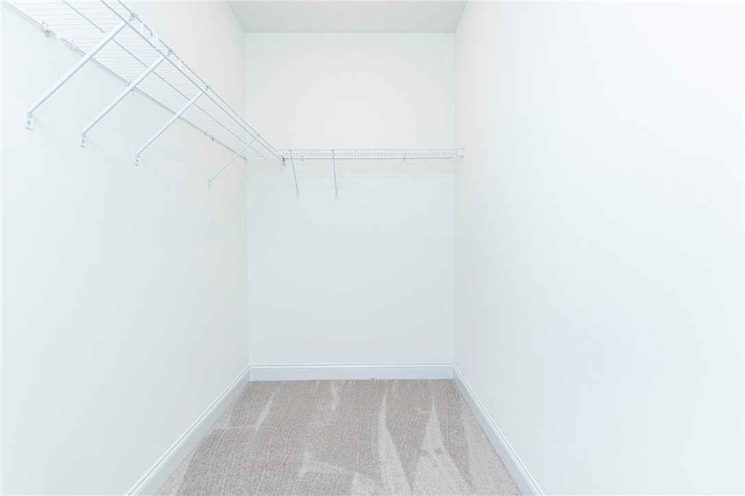 328 Point Road Westminster, SC 29693 - Photo 22 of 37 This spacious walk-in closet features ample shelving for organized storage.