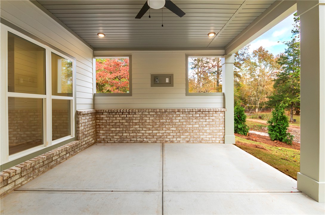 328 Point Road Westminster, SC 29693 - Photo 37 of 37 This inviting patio offers a tranquil outdoor retreat, perfect for relaxation and enjoying nature's beauty.
