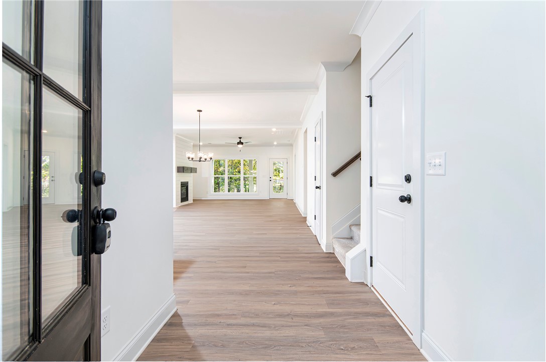 328 Point Road Westminster, SC 29693 - Photo 5 of 37 This bright entry opens to a spacious living area with warm wood floors and ample natural light.