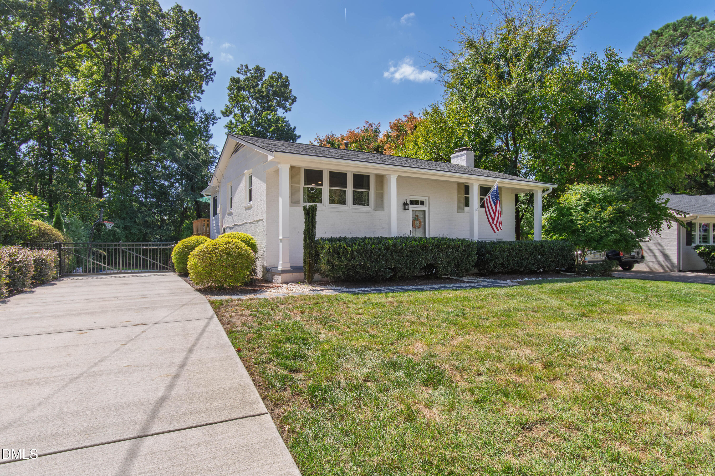 308 Latimer Road Raleigh, NC 27609 - Photo 47 of 50 a view of a house with backyard and garden