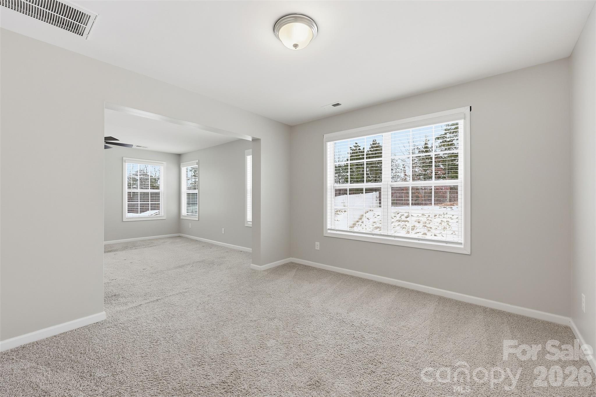 2314 Red Birch Way Concord, NC 28027 - Photo 30 of 44 an empty room with windows