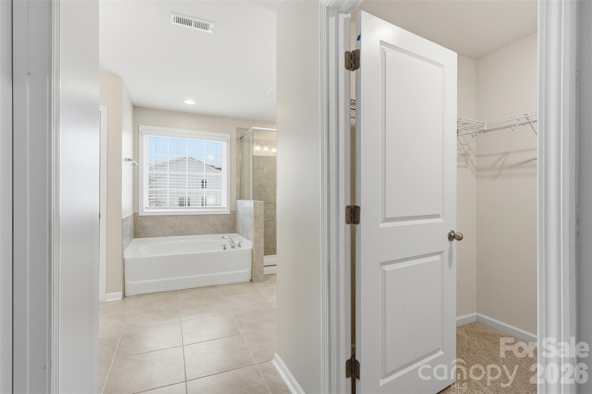 2314 Red Birch Way Concord, NC 28027 - Photo 32 of 44 a bathroom with a tub shower and sink