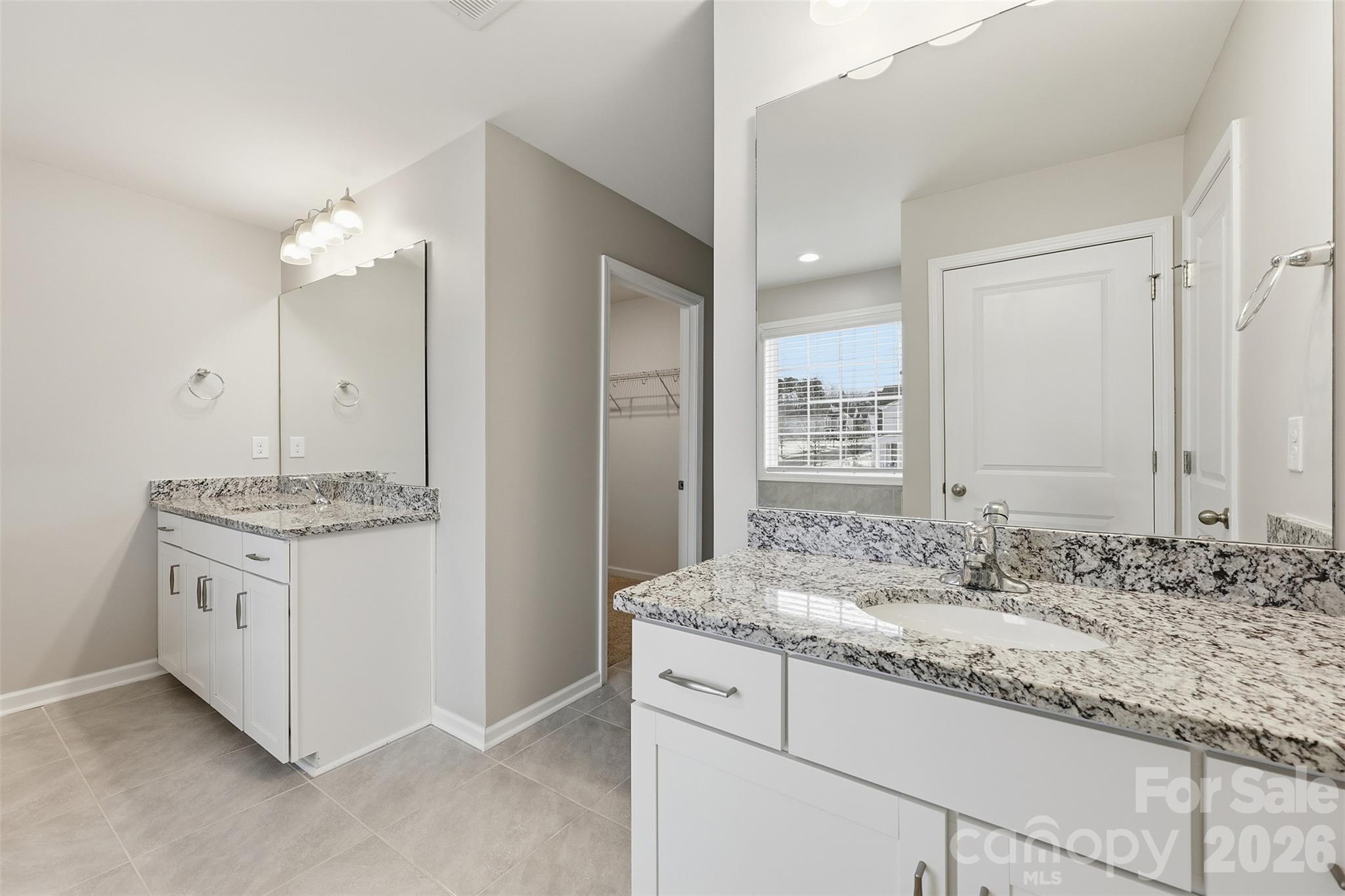 2314 Red Birch Way Concord, NC 28027 - Photo 33 of 44 a bathroom with a granite countertop sink and a mirror