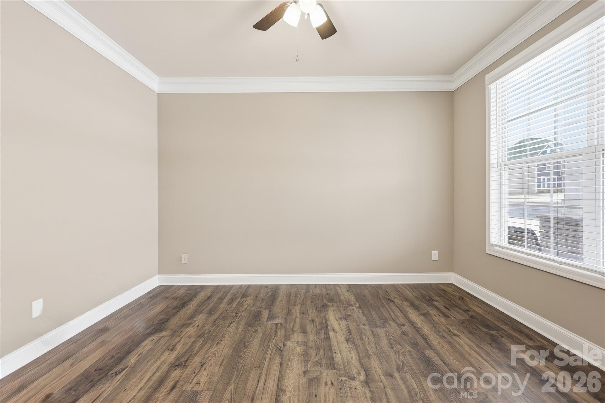 2314 Red Birch Way Concord, NC 28027 - Photo 8 of 44 wooden floor in an empty room with a window