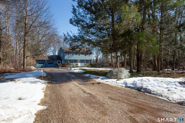 a view of street with with large trees