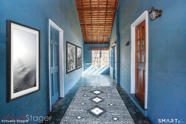 a view of hallway with windows