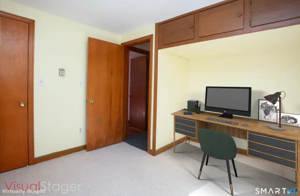 a room with furniture and a window