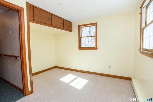 an empty room with windows