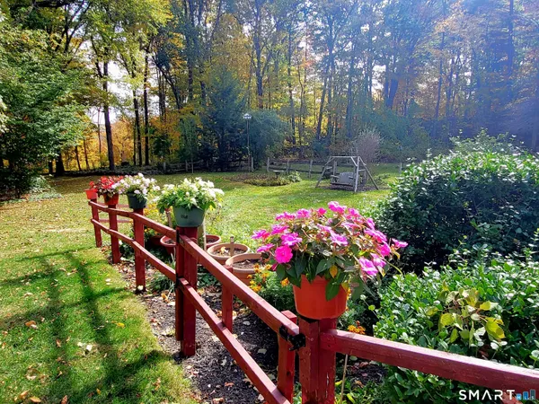 a garden view with a seating space