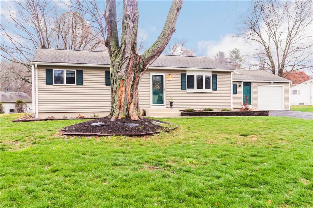62 High Tower Road South Windsor, CT 06074 - Photo 1 of 1 a front view of house with yard and green space