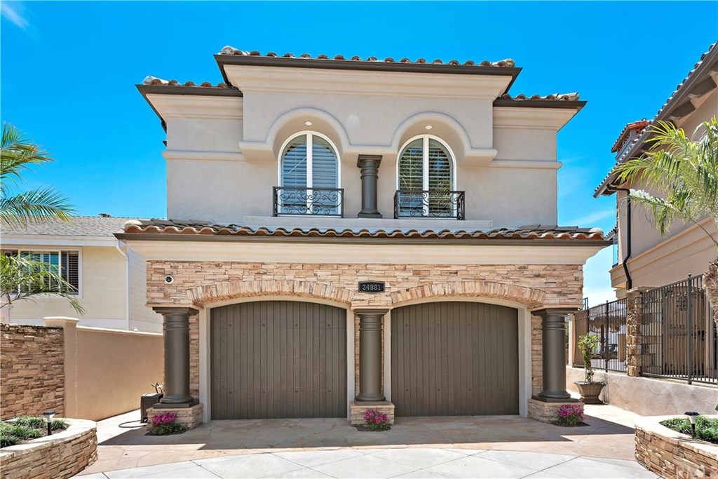 Such a gorgeous home. Freshly painted inside and out, with custom garage doors. Inside the garage there is a car lift for storing an extra sports car, or working on your vehicles.