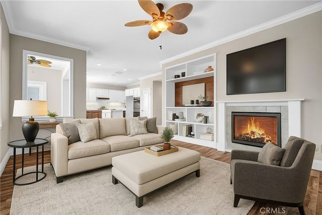 a view of an empty room and fire place