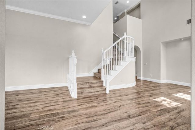 a view of a dining room with furniture and window