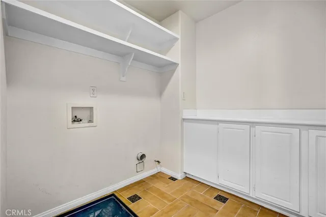a bathroom with a granite countertop sink mirror and double