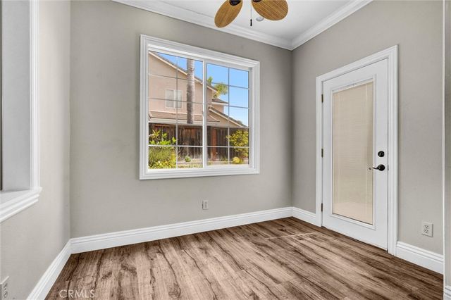 a kitchen with a stove a sink and a refrigerator