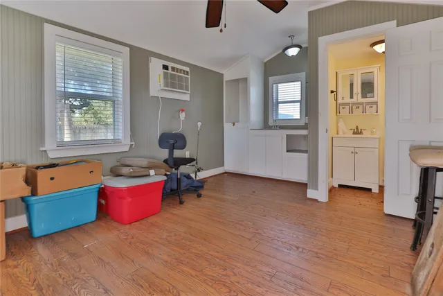 a view of kitchen with wooden floor