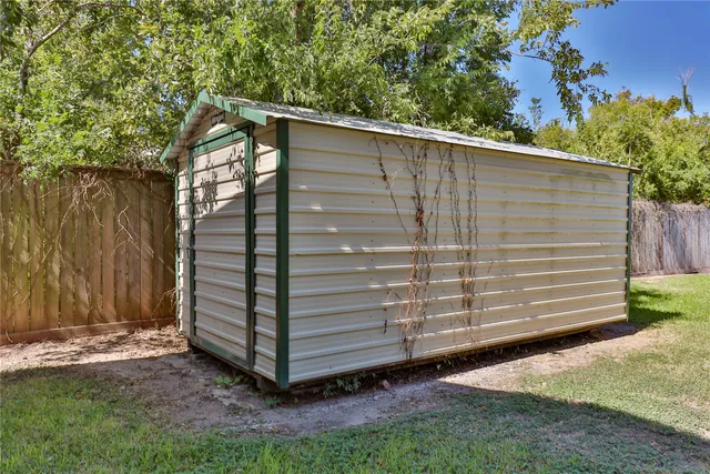 a house view with a garden space