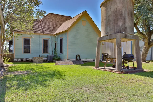 a view of backyard with green space