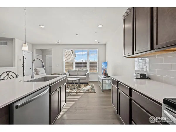 a bedroom with a bed and chair