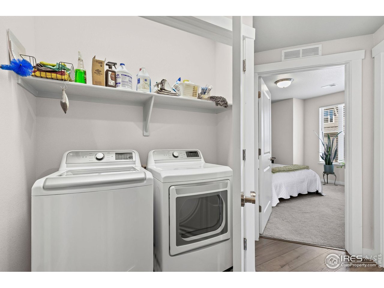 330 High Point Drive, Unit B103 Longmont, CO 80504 - Photo 18 of 18 a utility room with dryer and washer