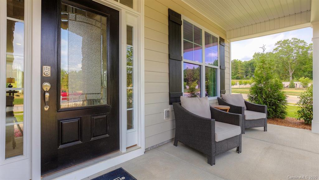 3377 Friendship Street Indian Land, SC 29707 - Photo 2 of 44 a sitting area with glass door