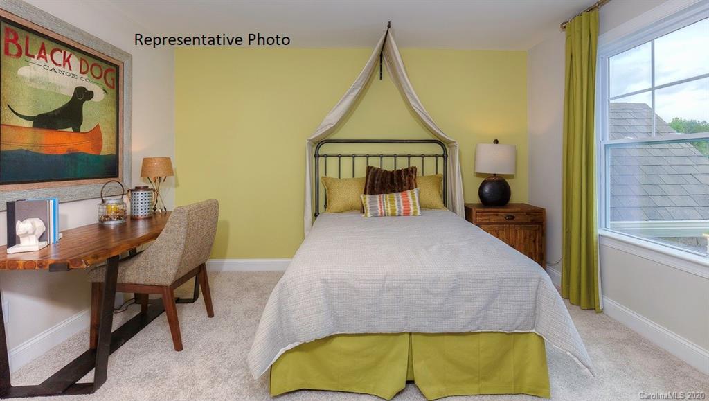 3377 Friendship Street Indian Land, SC 29707 - Photo 34 of 44 a bedroom with a bed and painting on the wall