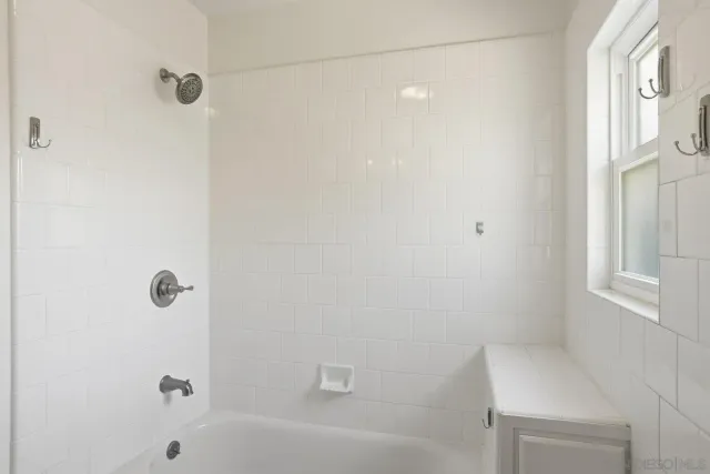 a bathroom with a bathtub