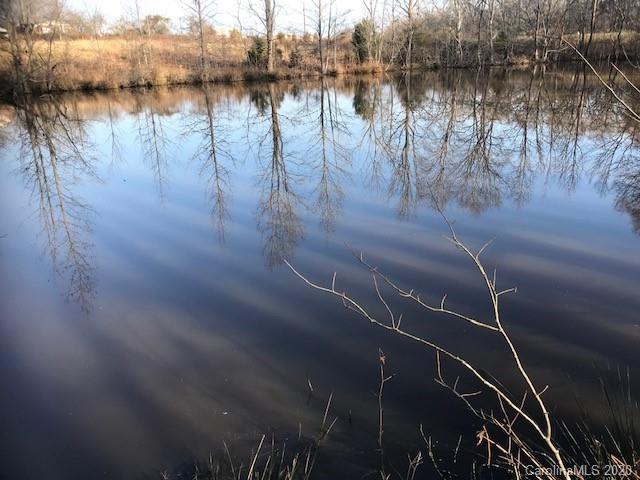 0 McIntyre Road, Unit 3 Wingate, NC 28174 - Photo 4 of 12 a lake view with boat