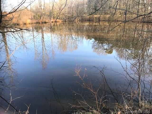 0 McIntyre Road, Unit 3 Wingate, NC 28174 - Photo 5 of 12 a view of lake with green space