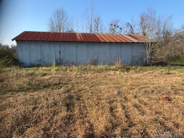 0 McIntyre Road, Unit 3 Wingate, NC 28174 - Photo 7 of 12 a view of a yard with wooden fence