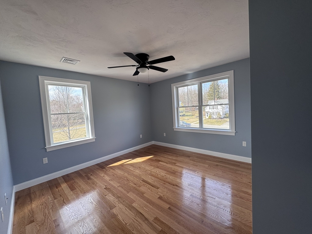 191 East Spring Street Avon, MA 02322 - Photo 16 of 33 a view of an empty room with a window
