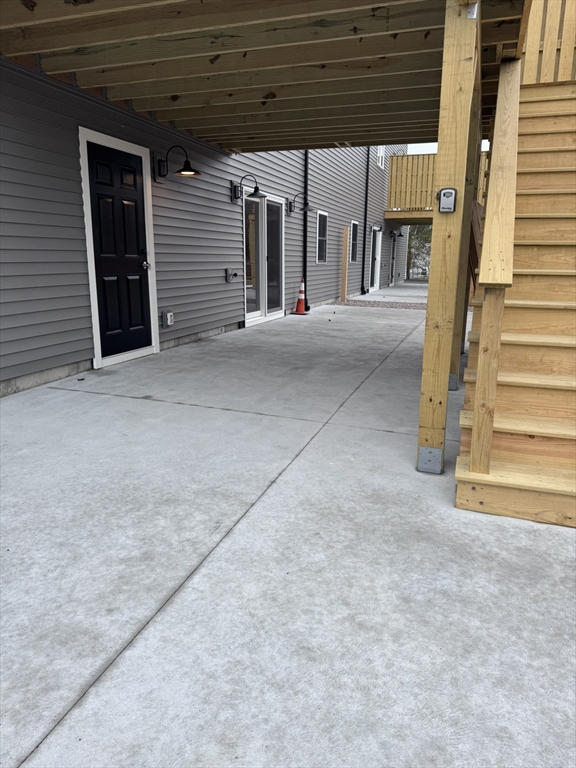 191 East Spring Street Avon, MA 02322 - Photo 28 of 33 a view of a house with a garage