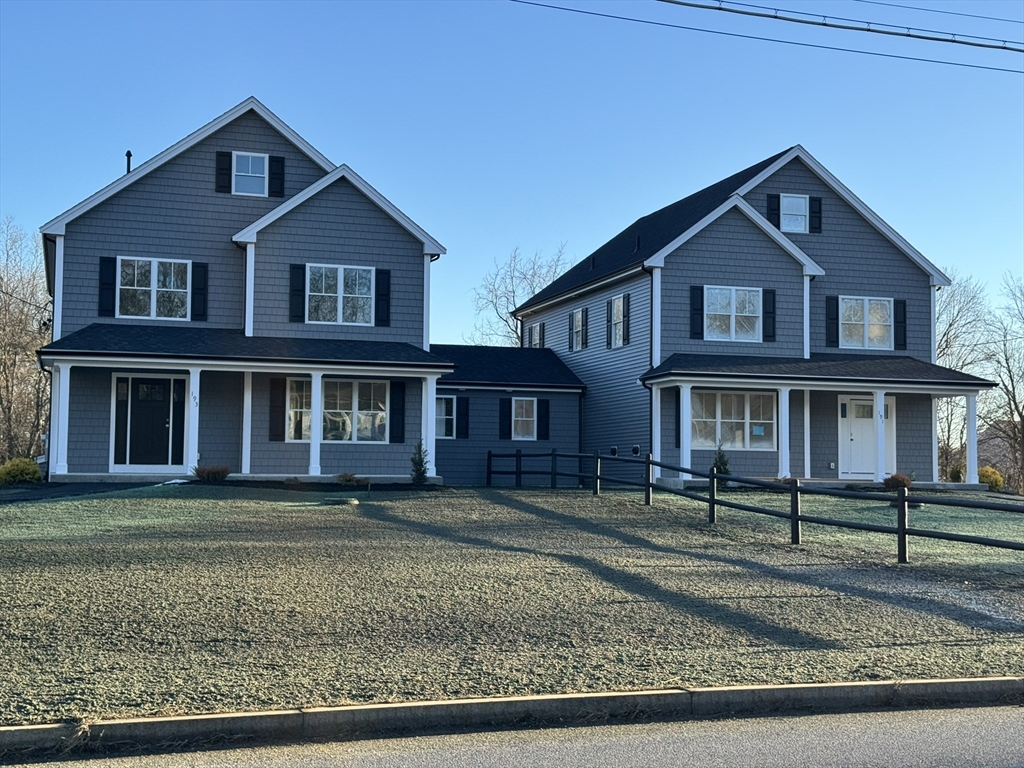 191 East Spring Street Avon, MA 02322 - Photo 33 of 33 a front view of a house with a yard