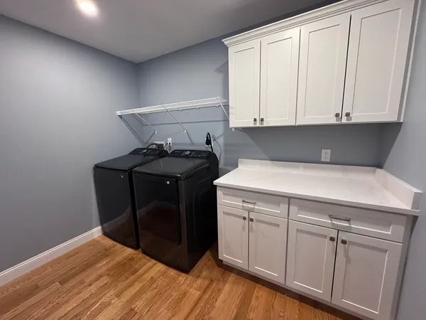 a utility room with washer and dryer