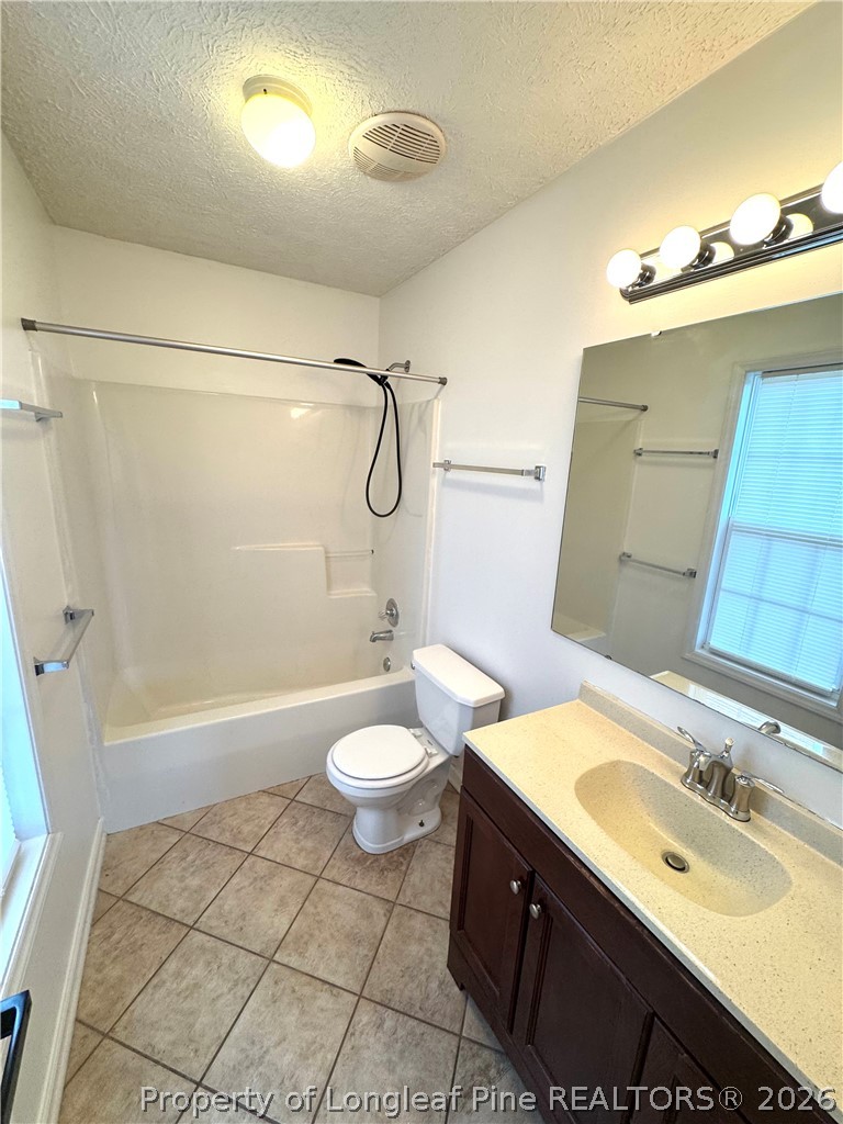 1050 Roundabout Road Cameron, NC 28326 - Photo 14 of 20 a bathroom with a sink a toilet and shower